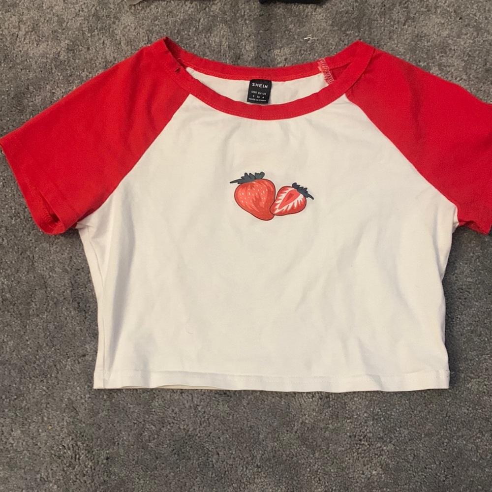 red and white cropped strawberry baseball top